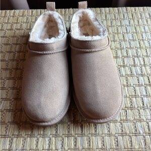 Ugg size 4  - sand. NEVER WORN